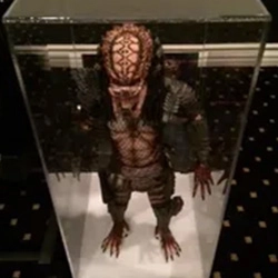 A display case with a predator in it's mouth.