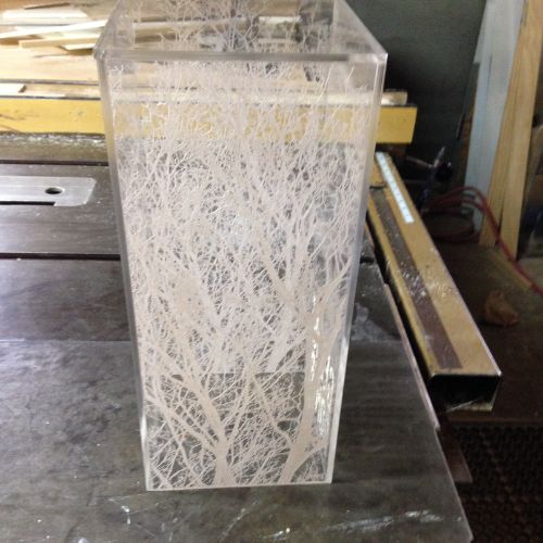 A clear plastic container sitting on top of a table.