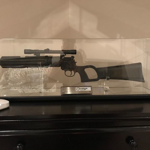 A gun that is on top of a table.